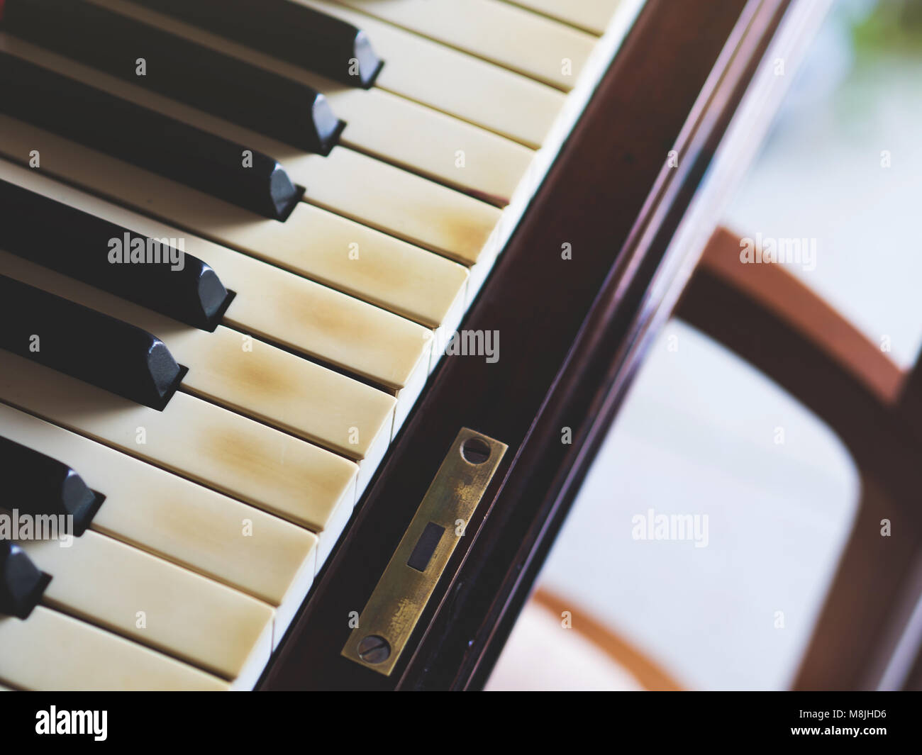 Old vintage piano keys closeup. Classic music instrument Stock Photo