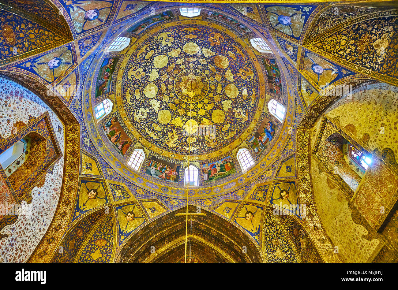ISFAHAN, IRAN - OCTOBER 20,2017: The dome and walls of Armenian Bethlehem Church in New Julfa are decorated with complex golden patterns and colored i Stock Photo