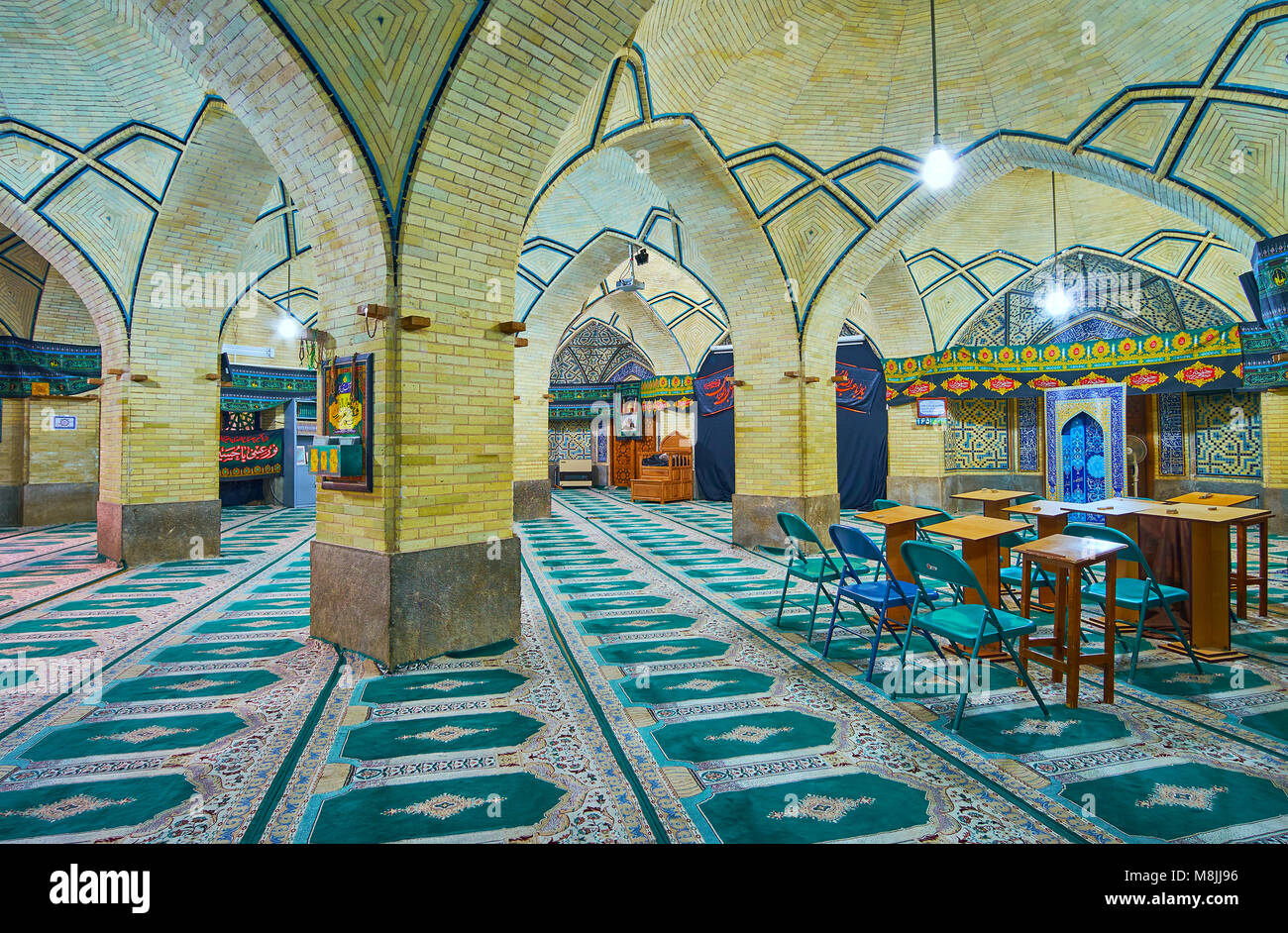 ISFAHAN, IRAN - OCTOBER 20, 2017: The classroom of Chaharbagh Theological school is located in the mosque, on October 20 in Isfahan. Stock Photo