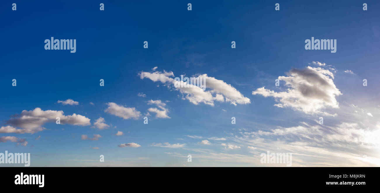 Sky background panorama with white clouds and a blue sky Stock Photo ...