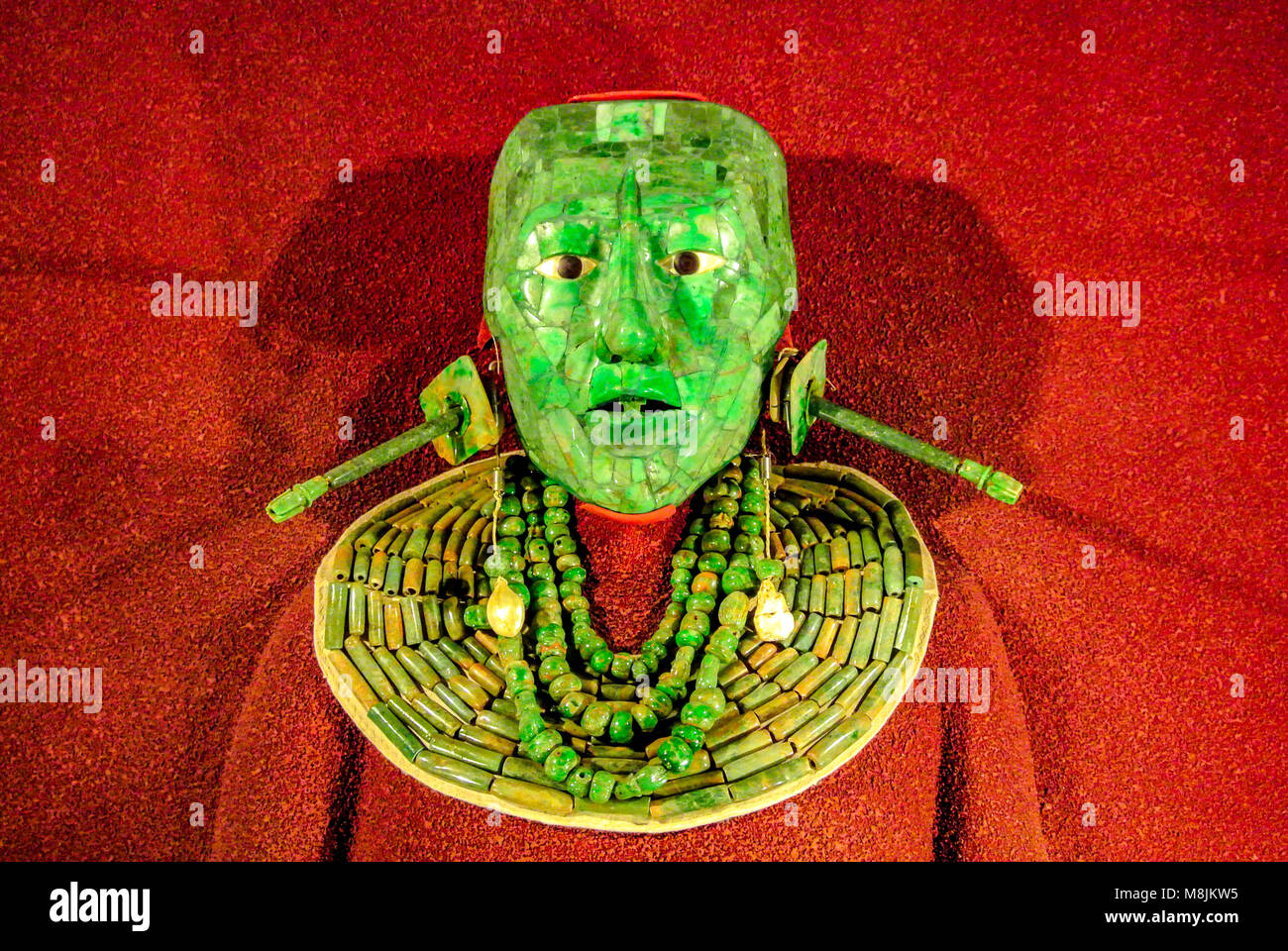 Mexico City, CDMX, Mexico, Funerary Mask of jade with funerary offerings for Pakal King of Palenque, Editorial only. Stock Photo