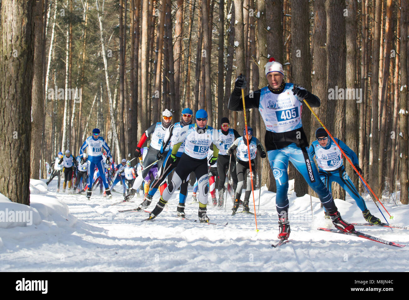 KAZAN, RUSSIA - March, 2018: professional sportsmen -athletes skiers running ski marathon Stock Photo