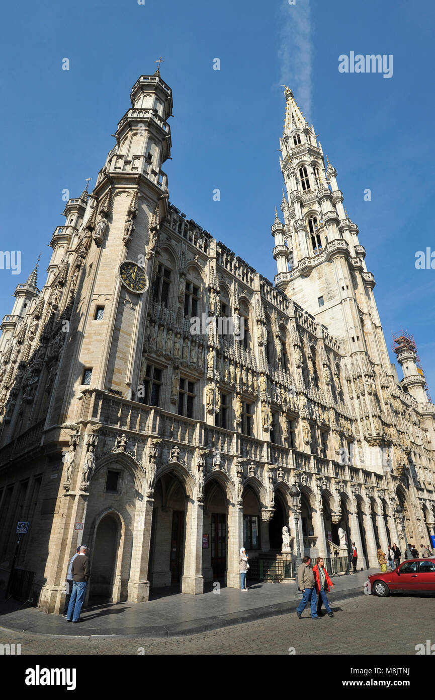 96 meter Brabantine Gothic Tower of Hotel de Ville (Town Hall) built 1402 to 1454 designed by Jacob van Thienen and Jan van Ruysbroek on Grand Place ( Stock Photo