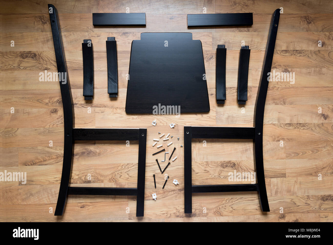 Assembly of wooden furniture, wooden parts of the dining chair Stock Photo Alamy