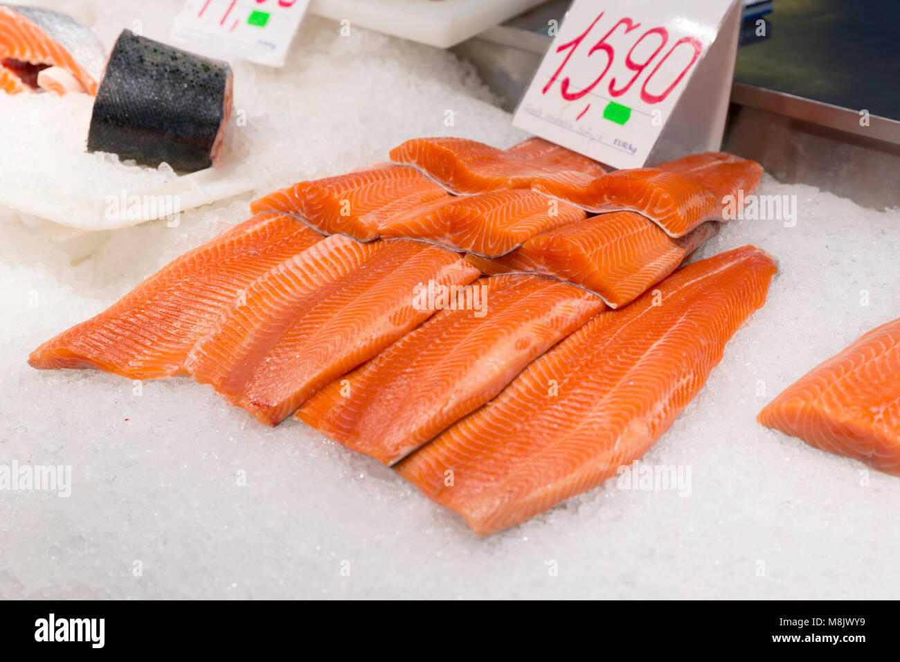 Salmon fillet at fish market. Fresh fish and healthy meal rich in