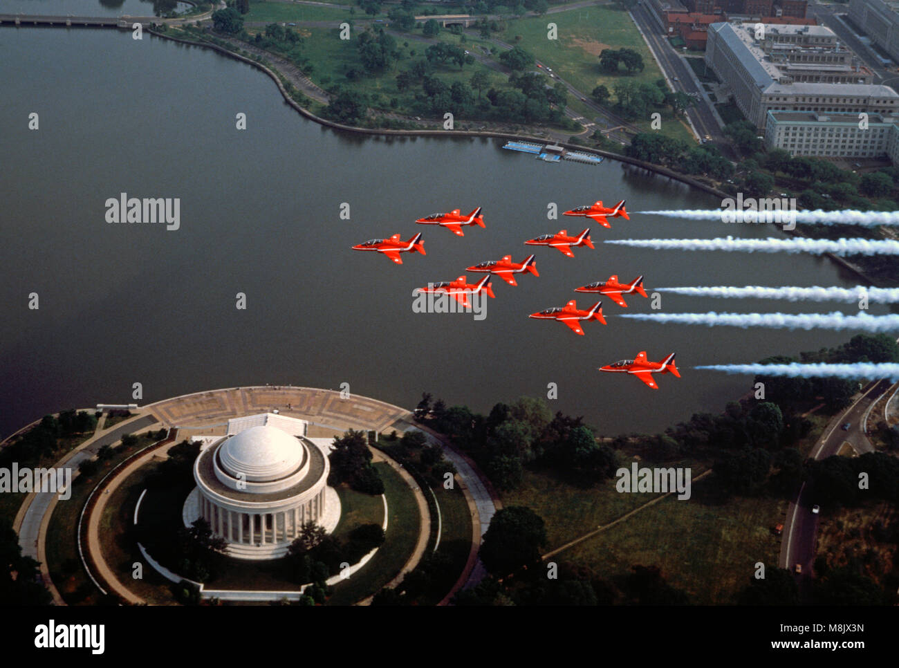 The Red Arrows  ( the Aerobatic display team of the Royal Air Force) overflying the Jefferson Memorial, Washington D.C. USA Stock Photo