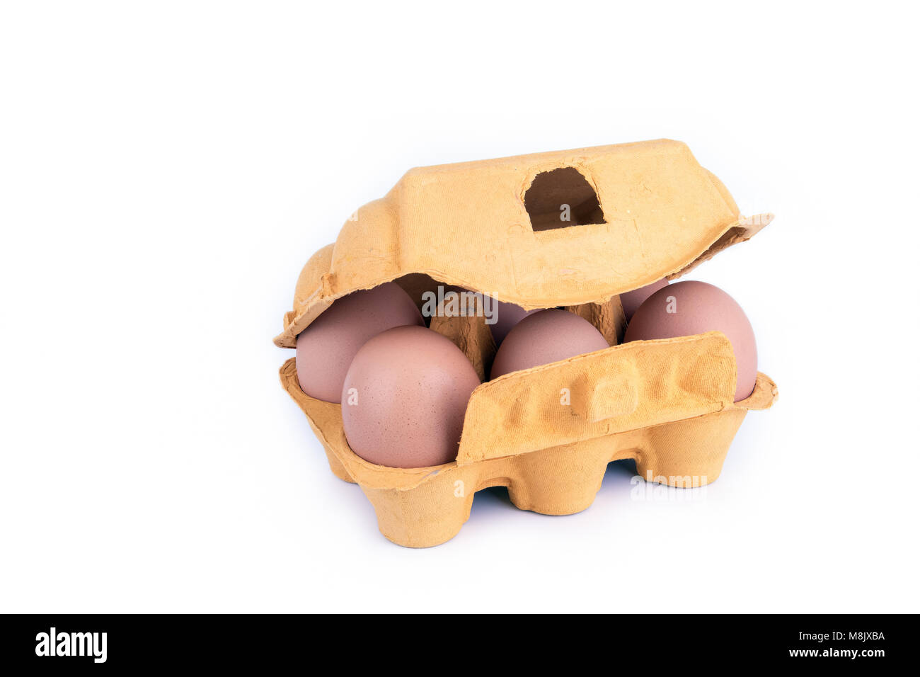 chicken eggs in box on white background Stock Photo - Alamy