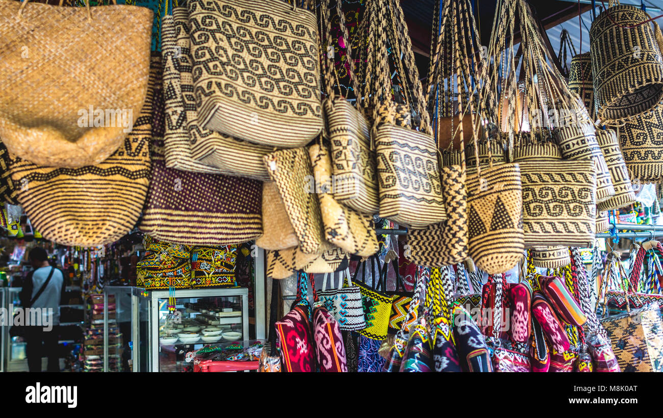 Rattan handbag with Dayak indigenous people of Borneo tribal pattern ...