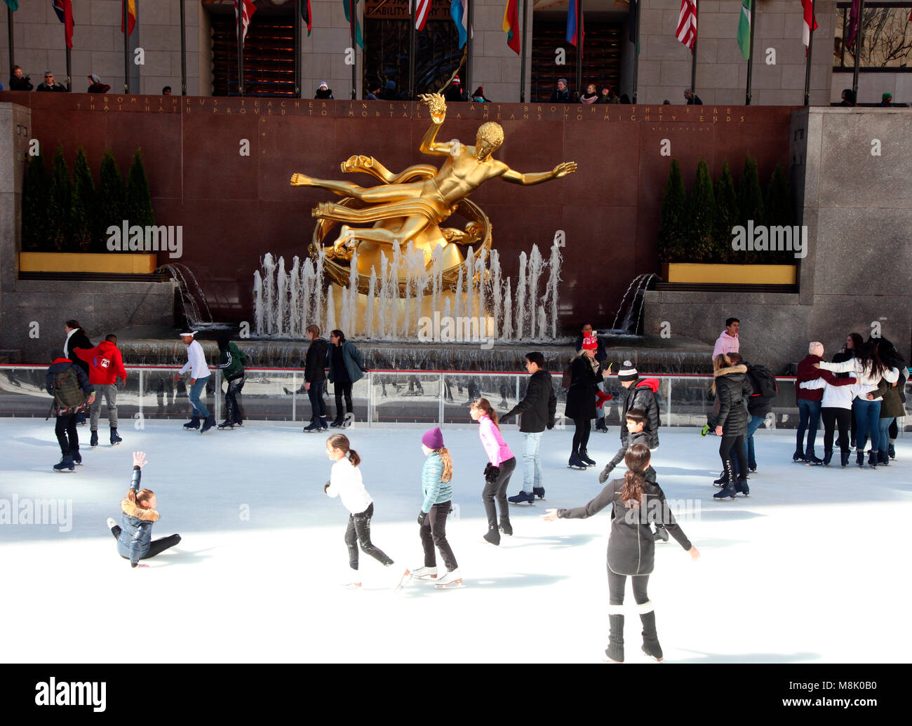 Skaters on the Rockefeller Ice rink, NYC Stock Photo