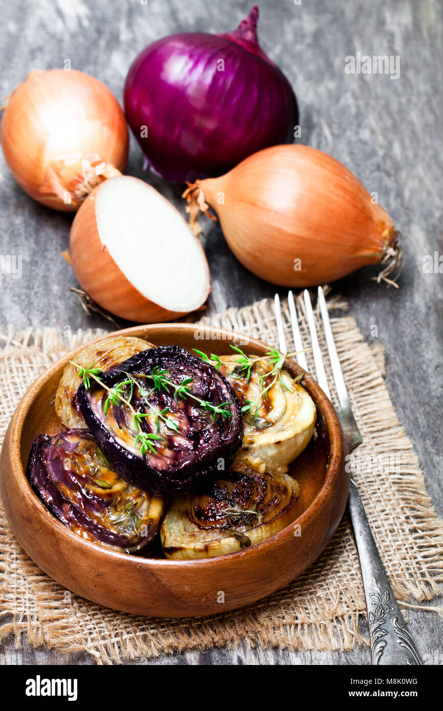 Delicious caramelized onions in balsamic vinegar with thyme Stock Photo
