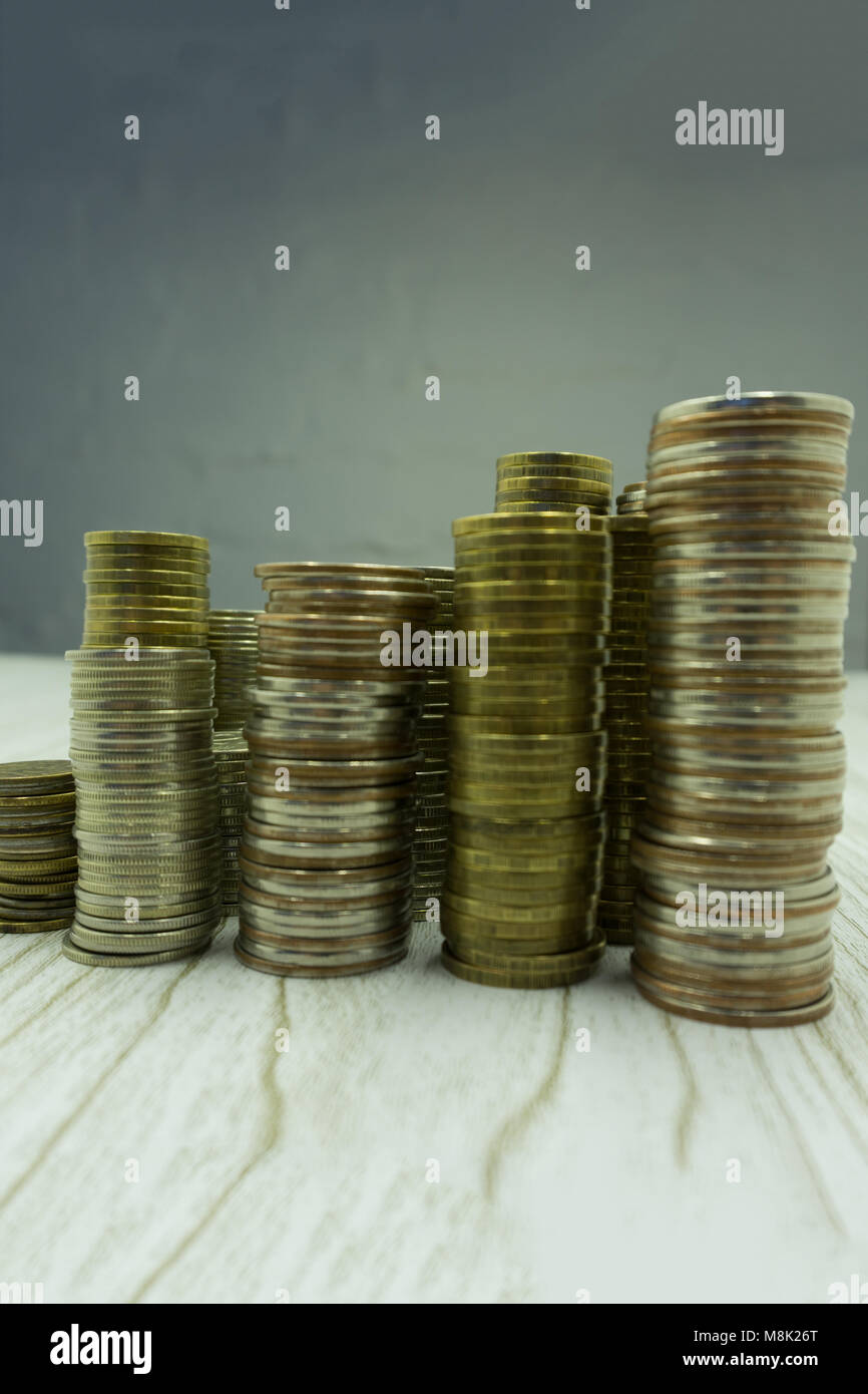 Stack of golden coins isolated on white background Stock Photo - Alamy