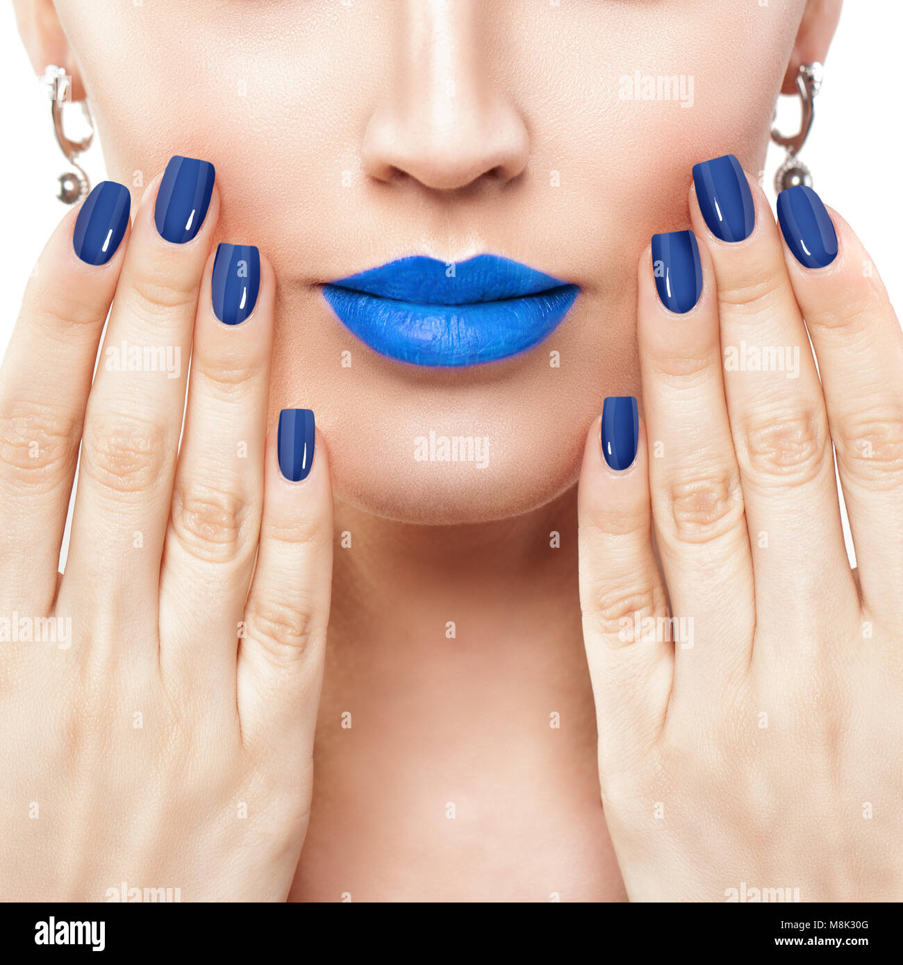 Woman Touching her Lips her Hand with Manicure. Makeup Lips with Trendy Blue Color Lipstick