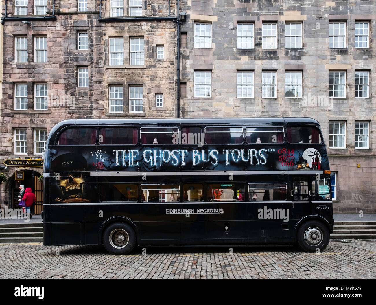 The Ghost Bus Tours double decker bus on the Royal Mile in Edinburgh, Scotland, United Kingdom Stock Photo