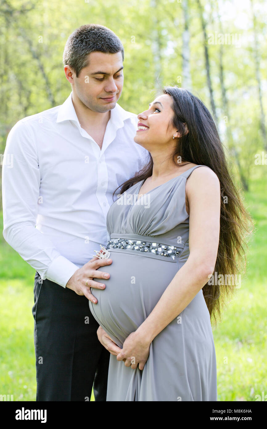 Portrait of a happy young couple Stock Photo - Alamy