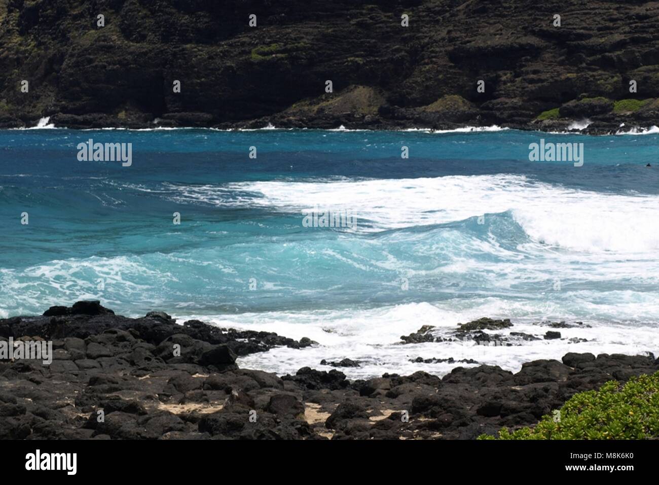 Ocean waves crashing against the rocky shore Stock Photo - Alamy