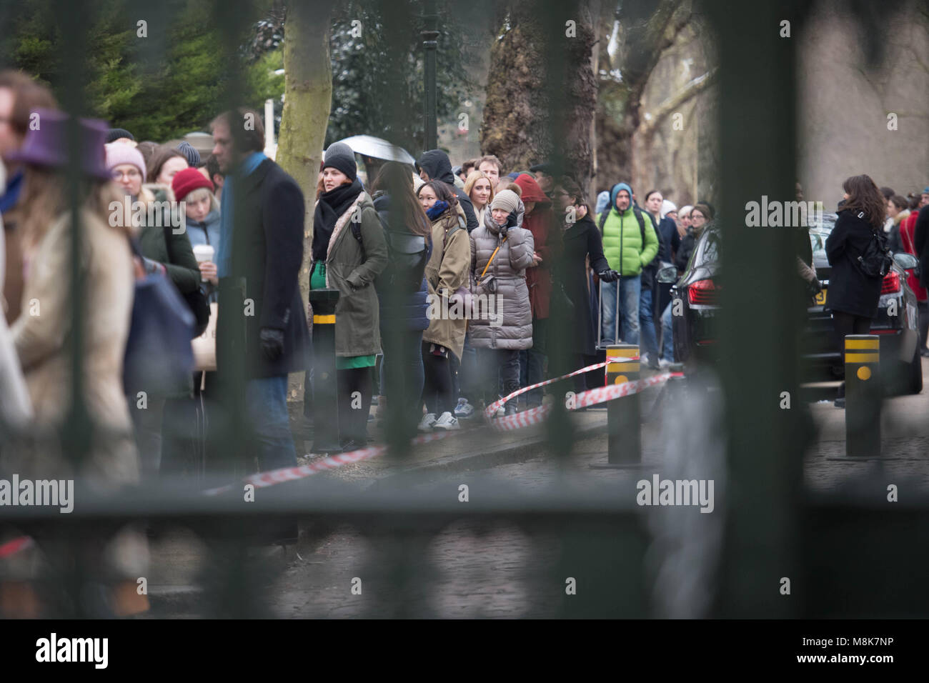 Russian citizens queue outside russian embassy hi-res stock photography ...