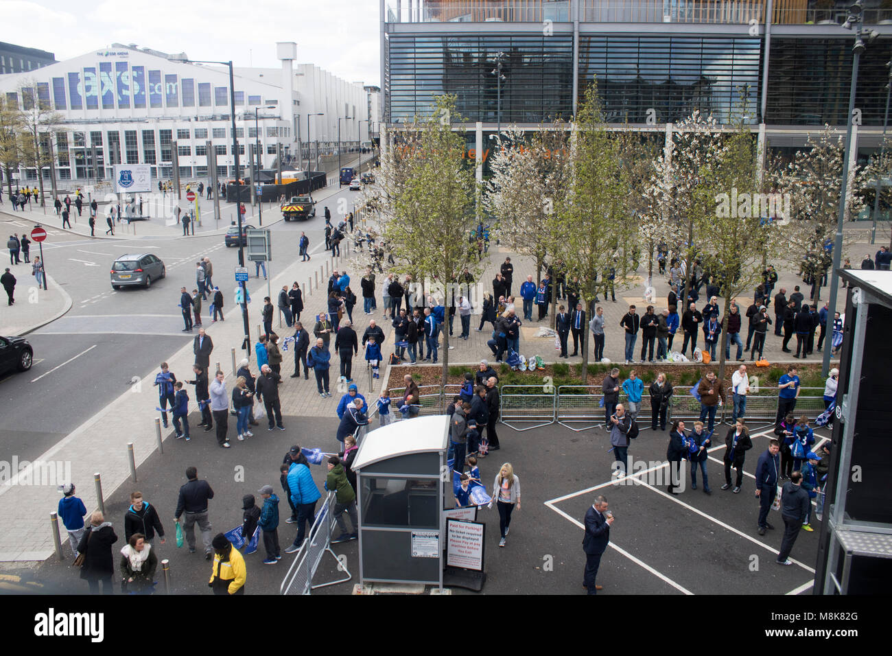 Everton football club fans wearing blue at Wembley Stadium in London Stock Photo