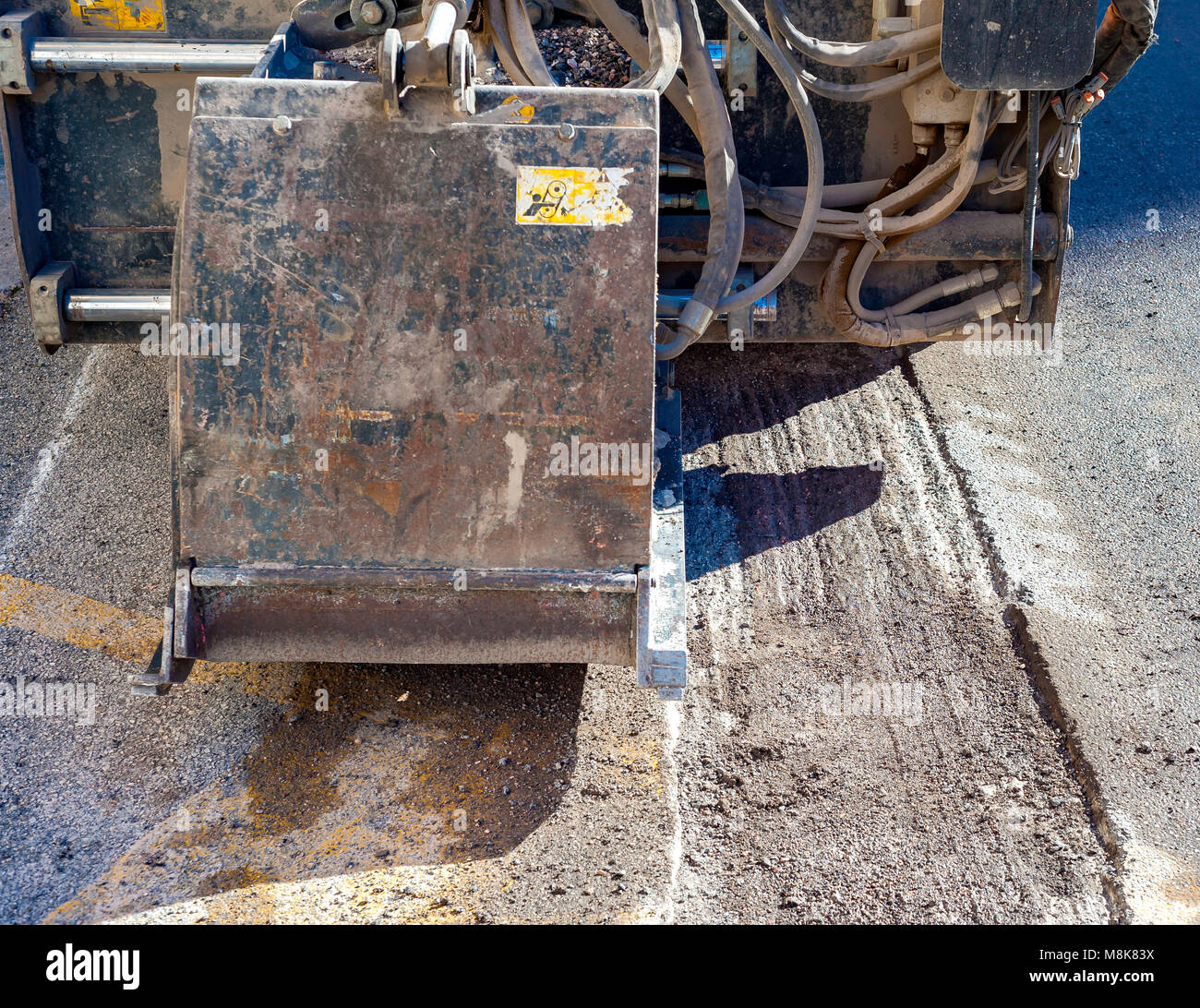 worker driver Skid steer remove Worn Asphalt during repairing Road