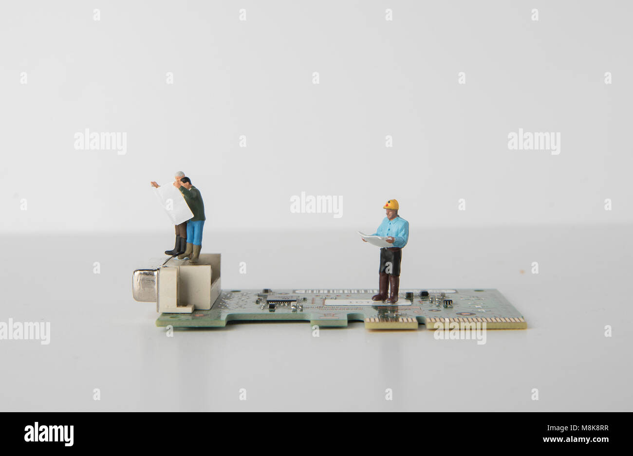 Miniature Figures imitating the working environment still life shots taken in a studio setup showing concepts of amintenance Stock Photo