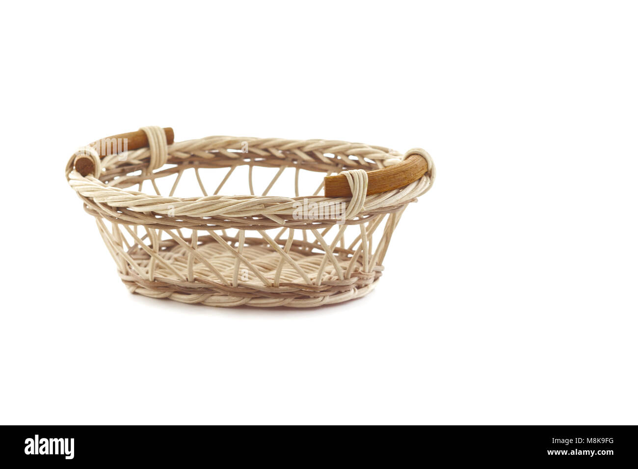 a Empty wicker basket on white background Stock Photo - Alamy