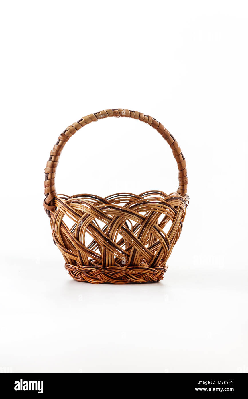 a Empty wicker basket on white background Stock Photo - Alamy
