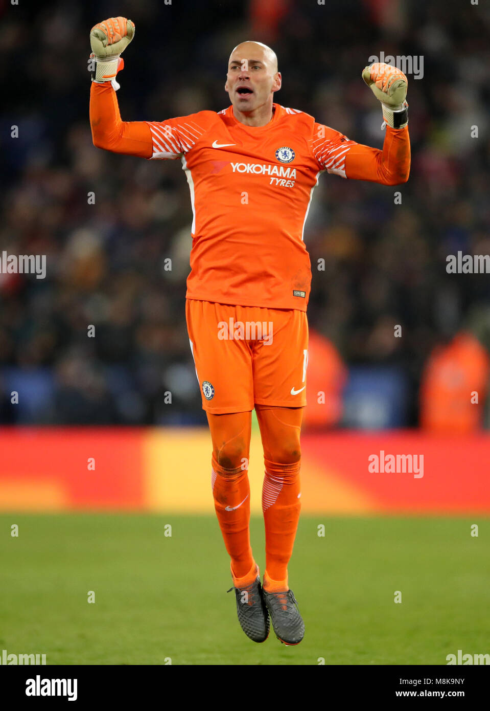 Chelsea goalkeeper Willy Caballero celebrates after Chelsea's Pedro