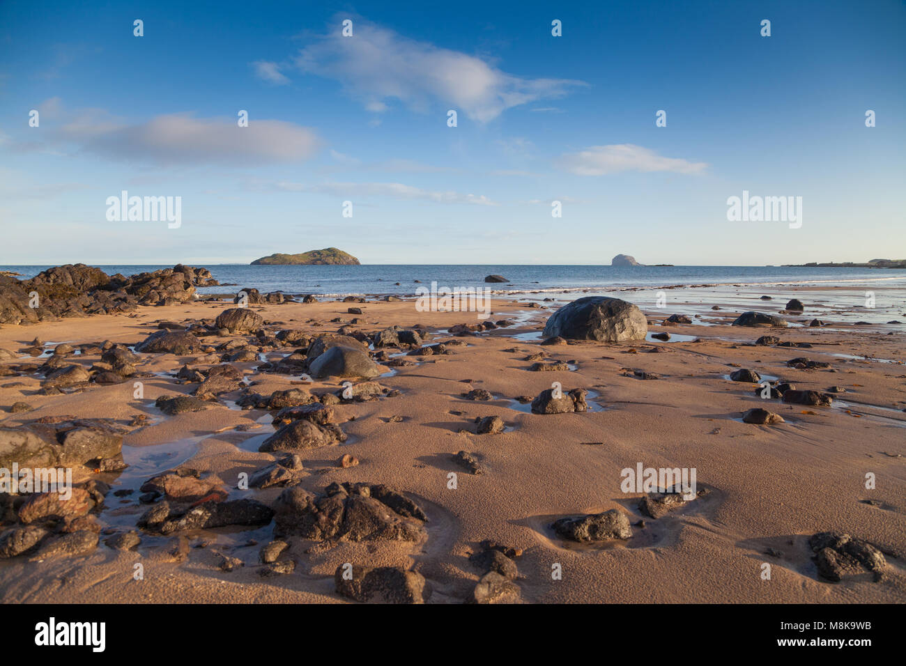 The beach at North Berwick at low tide with Craigleith and the Bass
