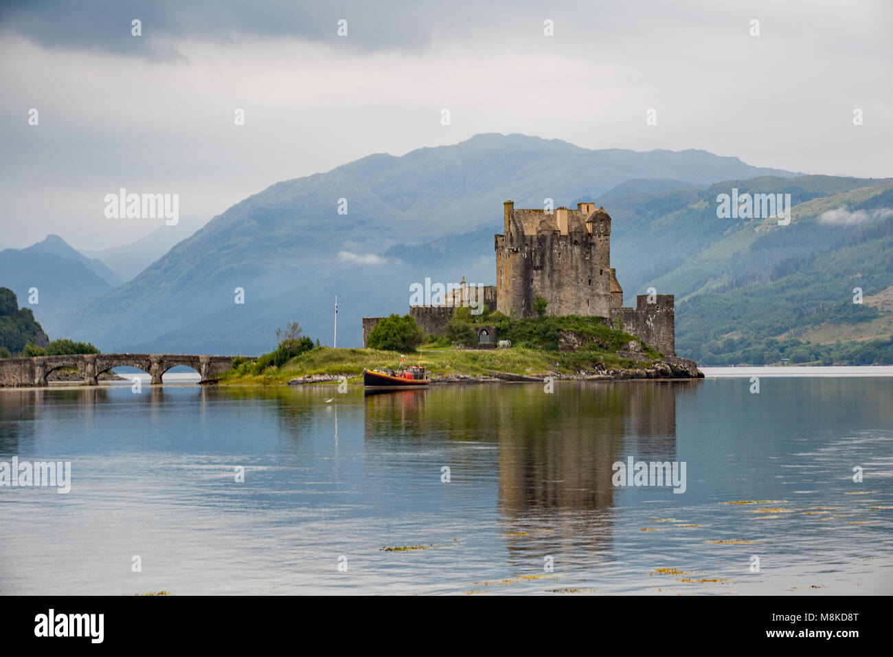 The Eileen Donan (or Island of Donan) Castle is a 13th Century Castle in the Highlands of Scotland. It is one of Scotlands most iconic landmarks. Stock Photo