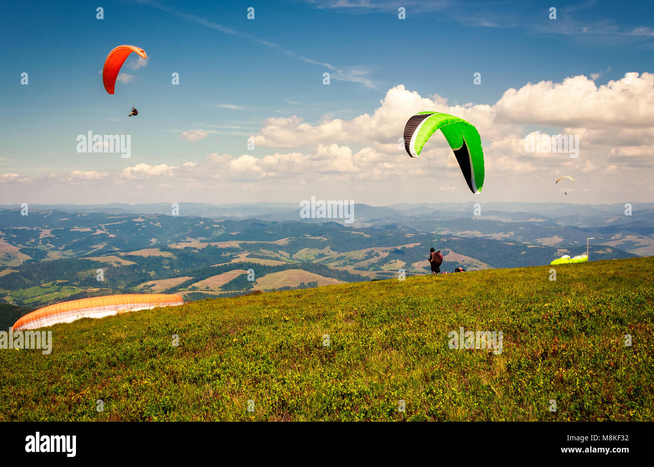Skydiving  flying over the mountains. parachute extreme sport Stock Photo