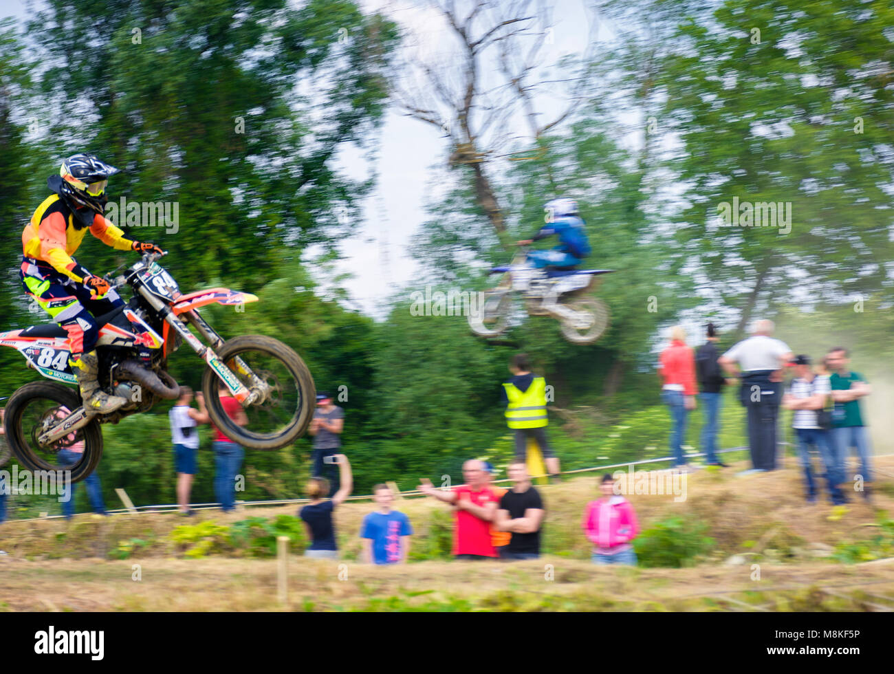 Uzhgorod, Ukraine - May 21, 2017: Extreme enduro MOTO SPORT Rider in the action. Motion blur with flying dirt. TransCarpathian regional Motocross Cham Stock Photo