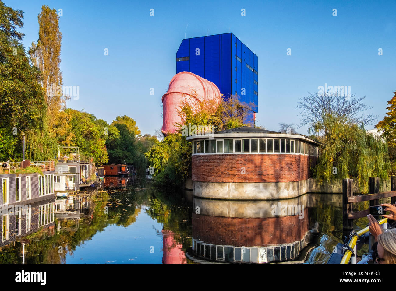 Berlin, Umlauftank by German architect Ludwig Leo on island in Landwehr canal.Giant pink pipe is a flotation tank to test floatability of ship parts Stock Photo