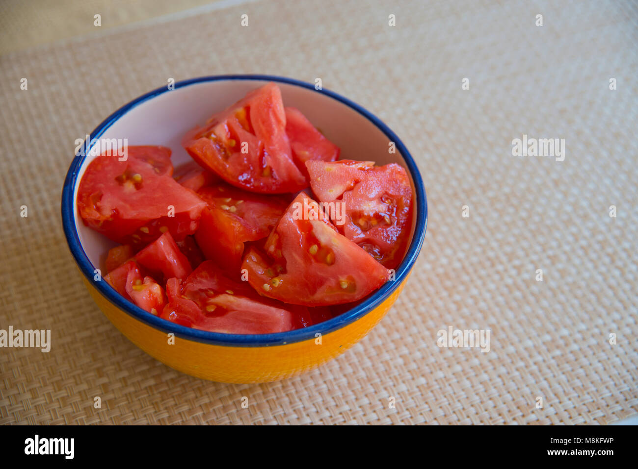 Chopped tomatoes in a bowl. Still life Stock Photo Alamy