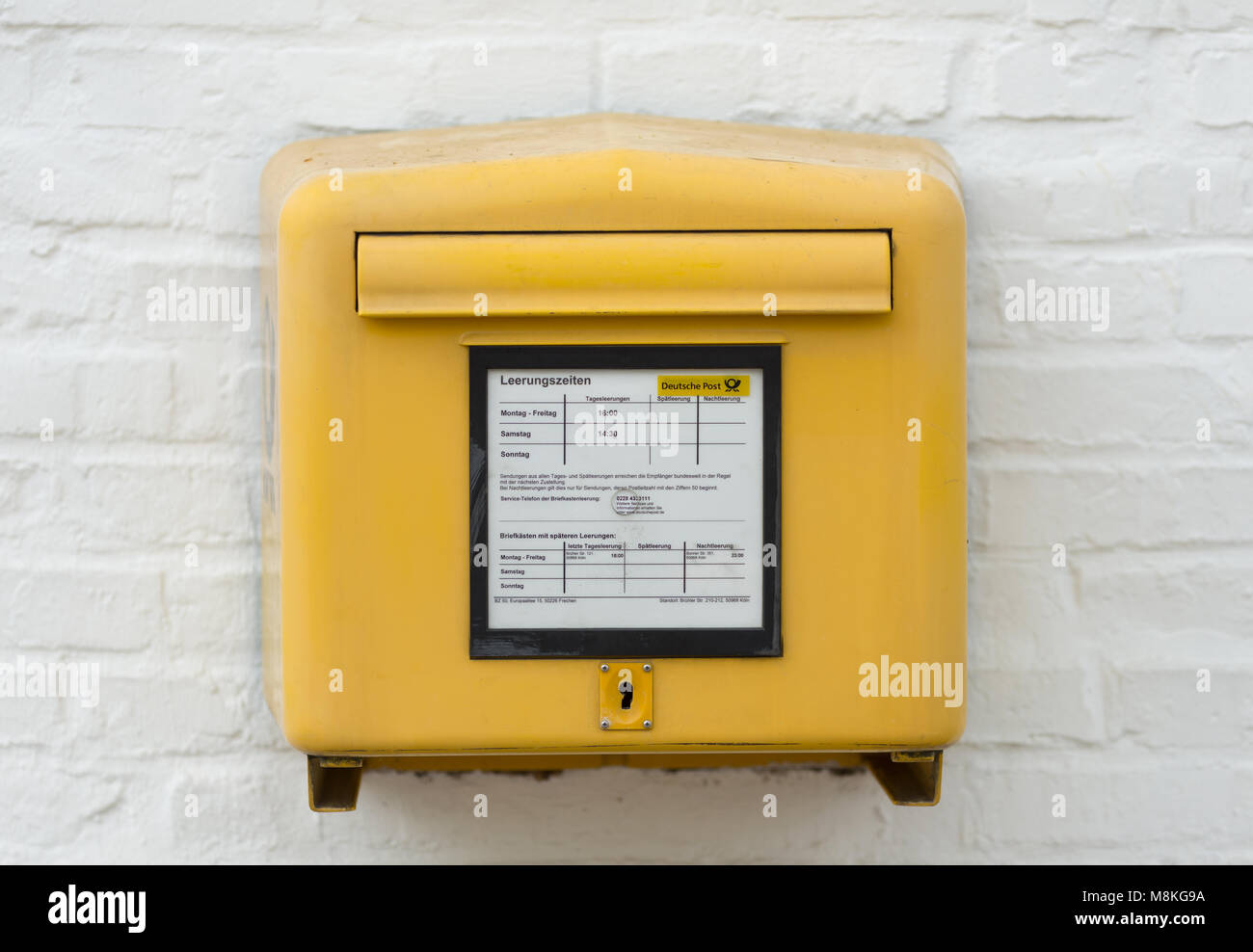 Yellow Deutsche Post Letterbox Stock Photo