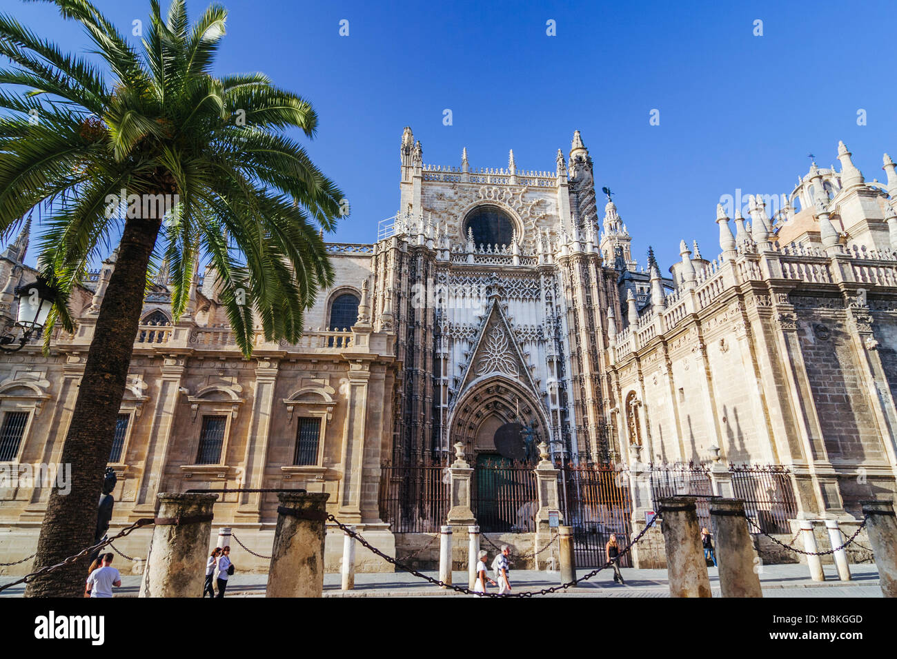 Seville, Andalusia, Spain : Tourists walk past the Puerta del Príncipe ...