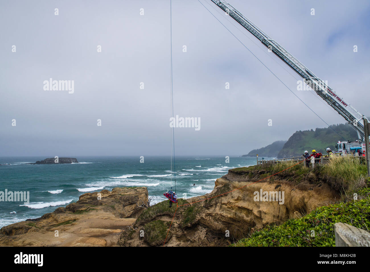 Newport fire department conducts a rescue drill at Devil's Punchbowl State Natural Area.  Otter Rock, Oregon Stock Photo