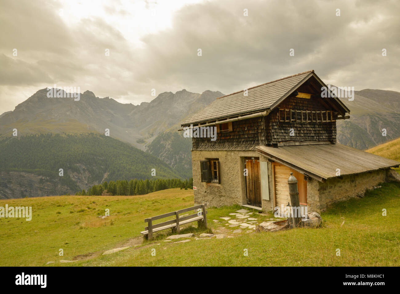 Small hut in Swiss Alps Stock Photo