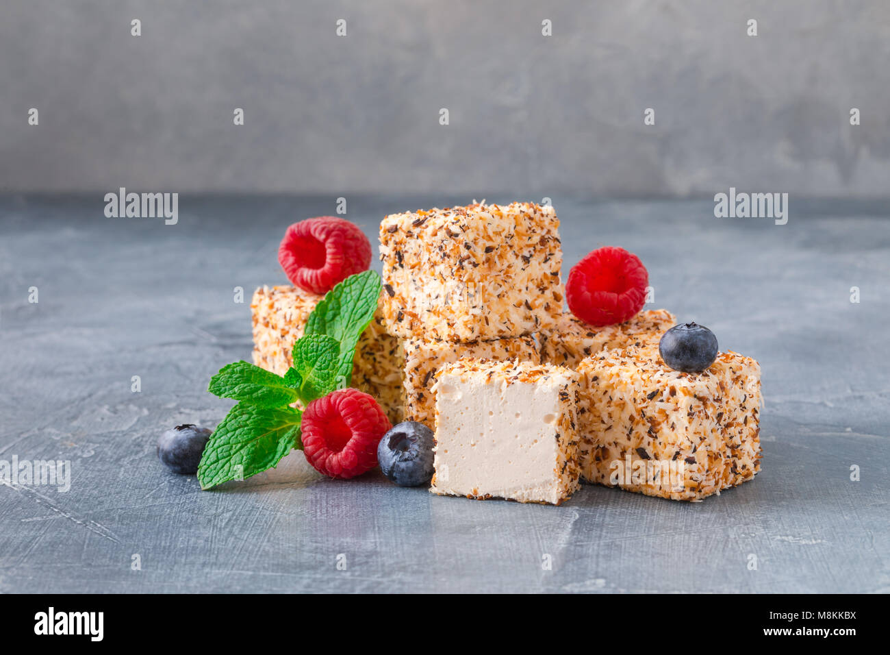 Homemade Sweets Or Candies Pigeon S Milk With Raspberries Blueberries And Mint Isolated Stock Photo Alamy