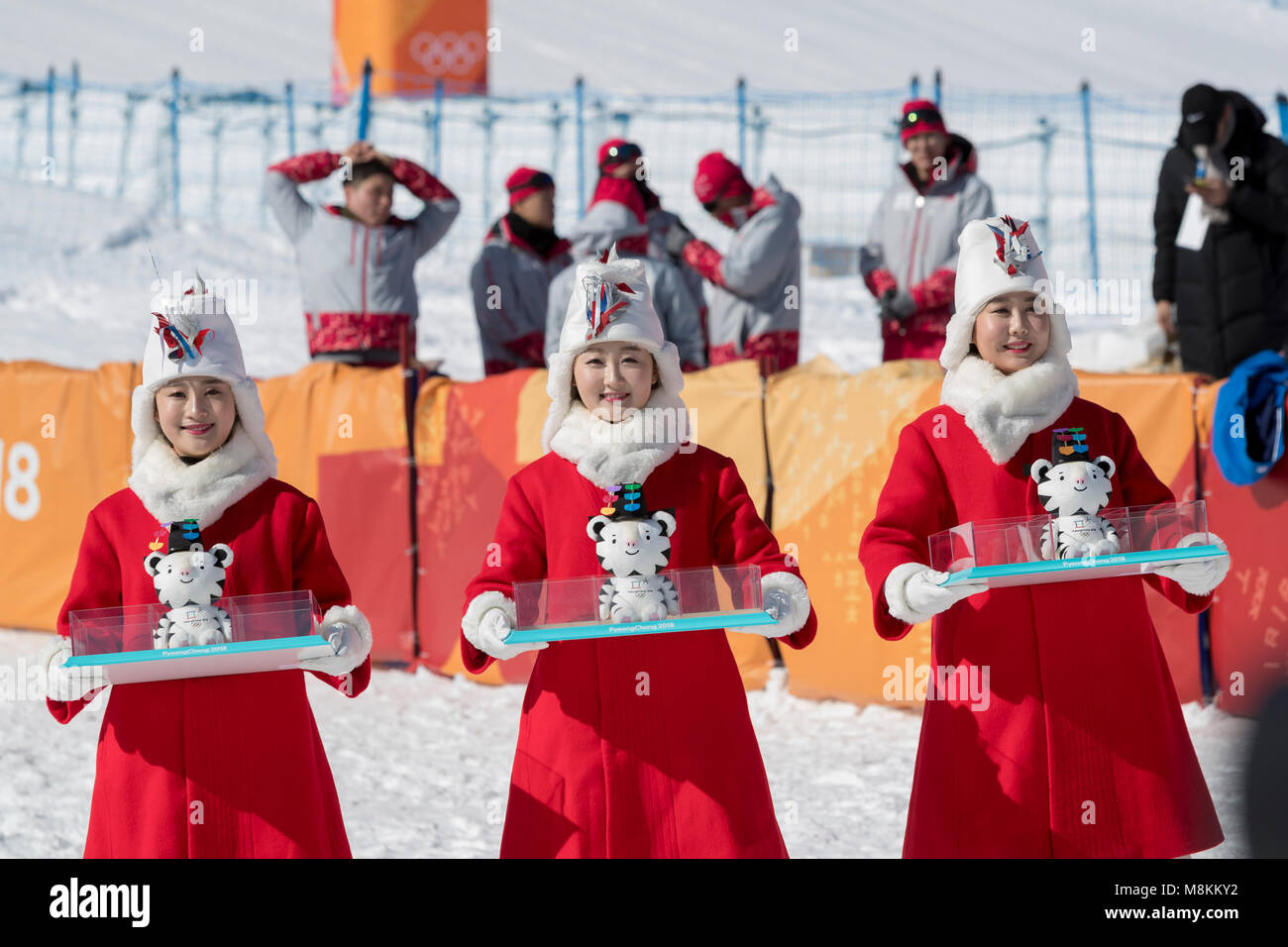 Award presenters with Soohorang the official mascot at the Ladies Snowboarding Half Pipe Olympic Winter Games PyeongChang 2018 Stock Photo