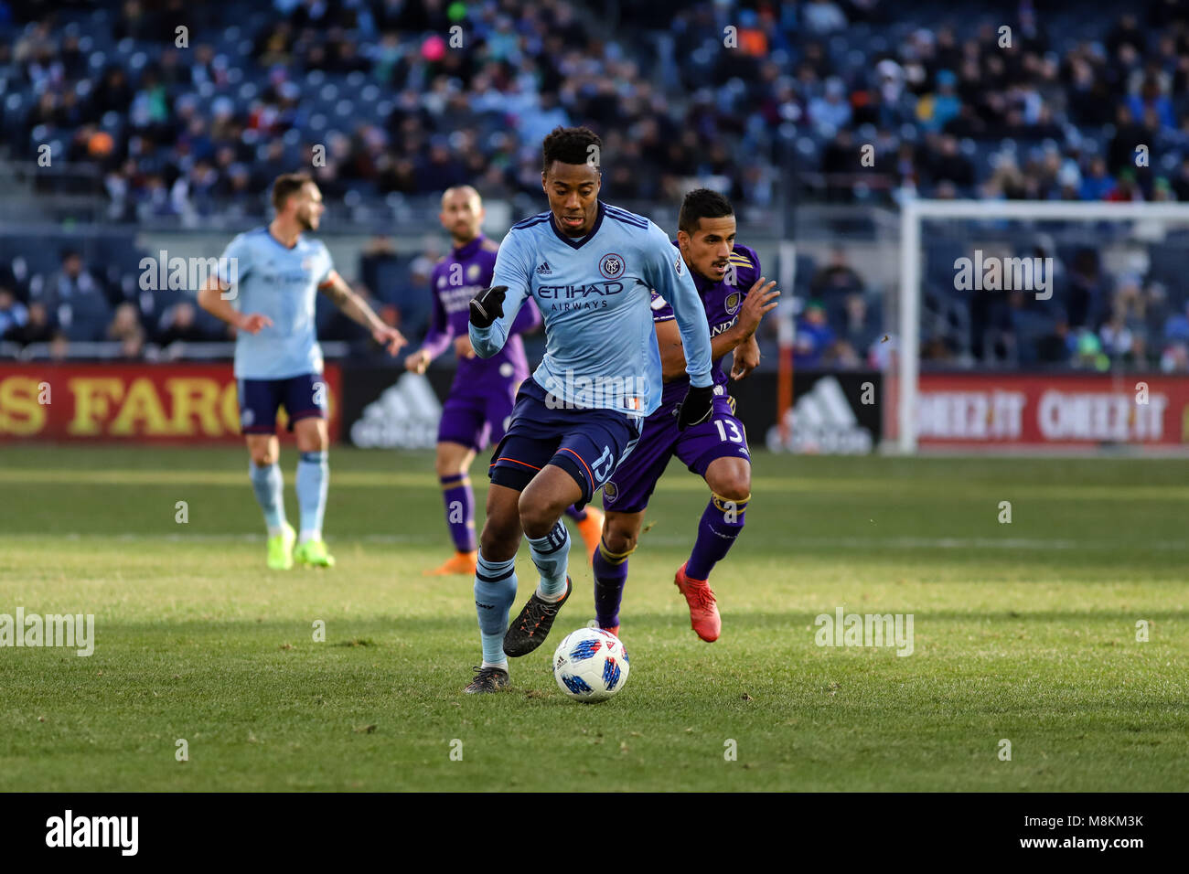 NYCFC vs Orlando City SC action at Yankee Stadium on 17th March 2018. NYCFC won 2-0. Saad Abdul-Salaam (13) dribbles up the pitch. Stock Photo