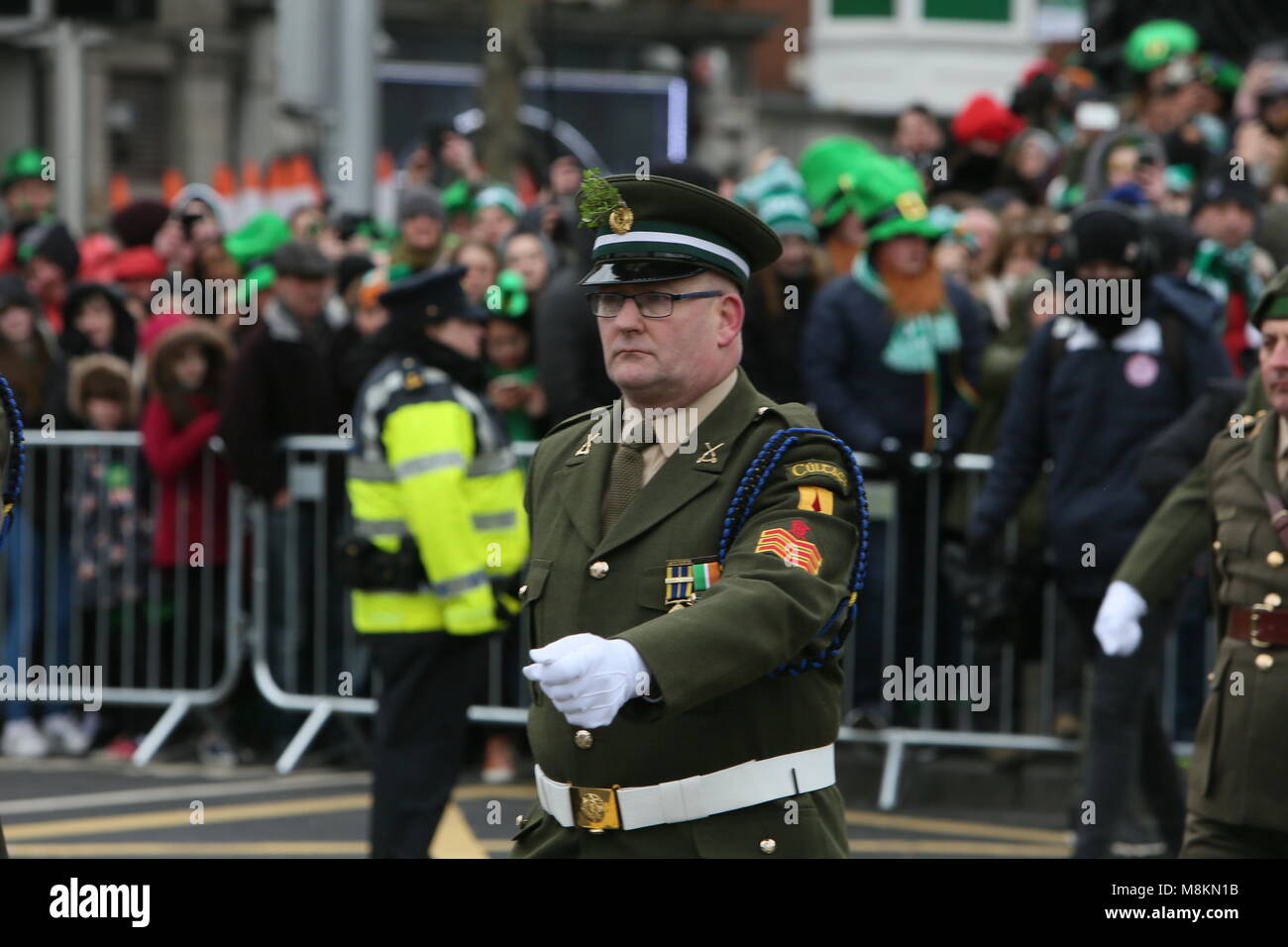 Irish Army Officers march on O'Connell Street. Image from Dublin city centre during the Saint Patrick's Day parade as part of the annual Saint Patrick Stock Photo