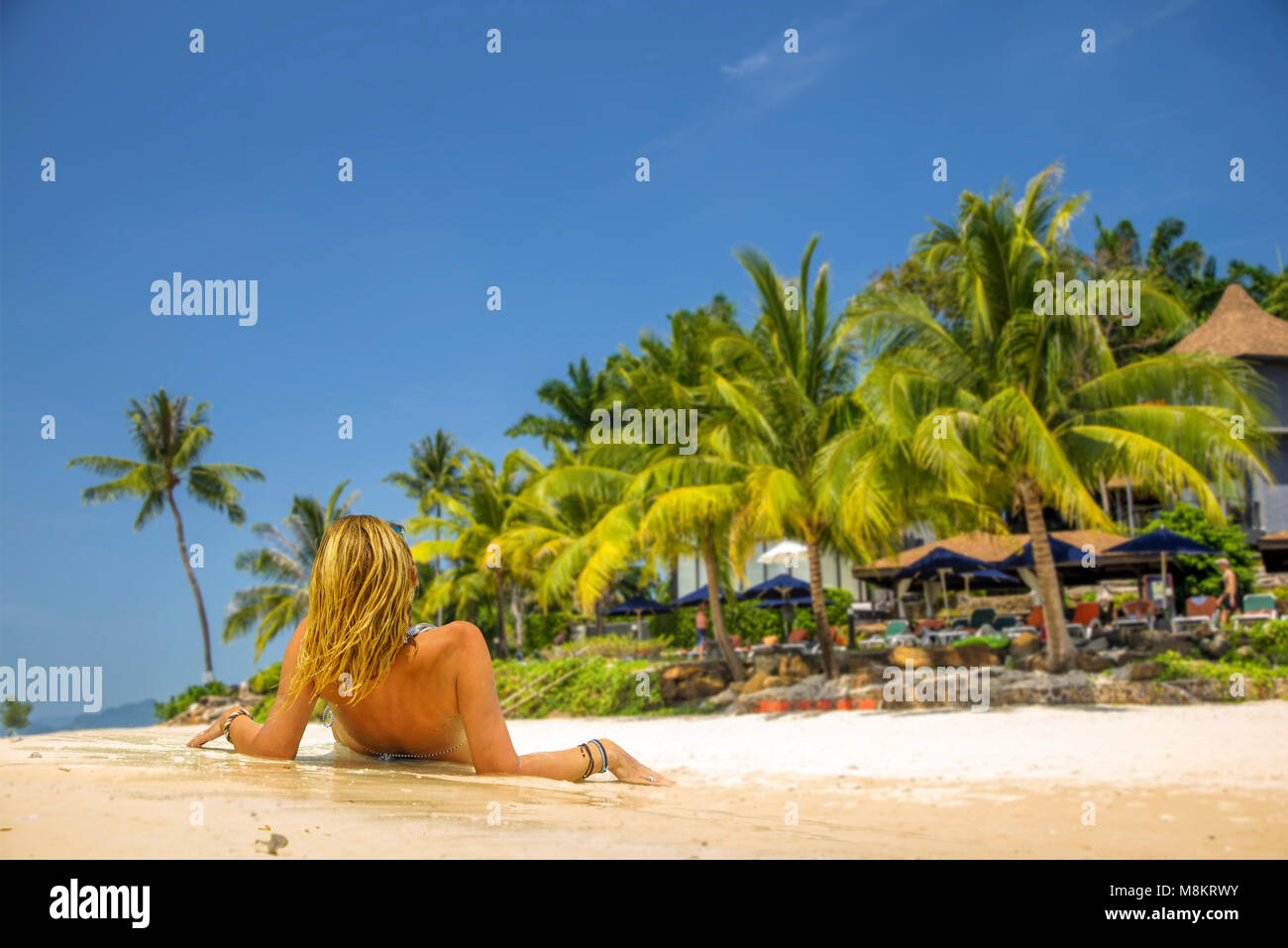 Classy woman on the Thai beach of Chaweng in Koh Samui Stock Photo