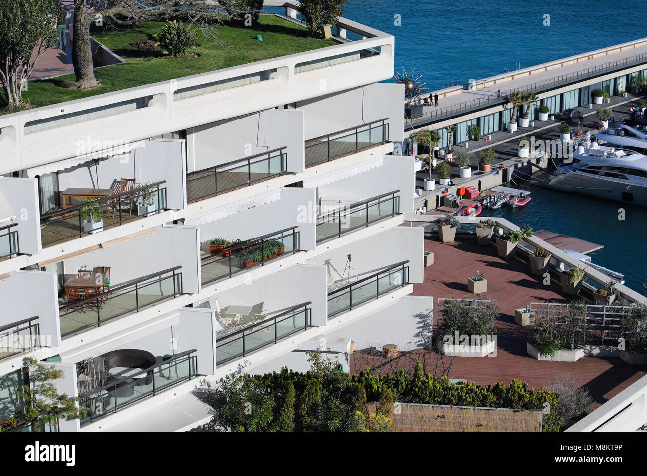 Monte-Carlo, Monaco - March 17, 2018: Luxury Seaview Balcony Apartment With Aerial View of The Mediterranean Sea And Yachts In The Monte-Carlo Harbour Stock Photo