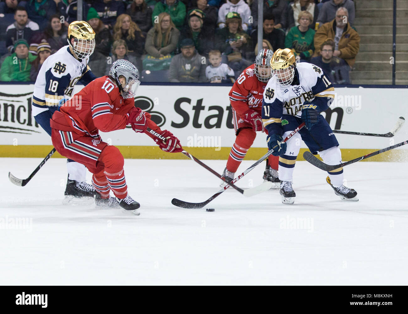 Overtime. 17th Mar, 2018. Notre Dame forward Cal Burke (11) and Ohio