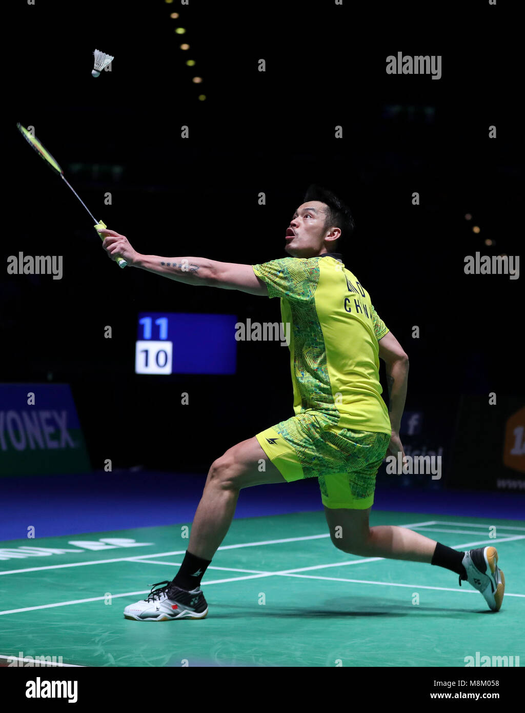 Birmingham. 18th Mar, 2018. Lin Dan of China returns the shot during the men's singles final with his compatriot Shi Yuqi at All England Open Badminton Championships 2018 in Birmingham, Britain on March 18, 2018. Credit: Han Yan/Xinhua/Alamy Live News Stock Photo