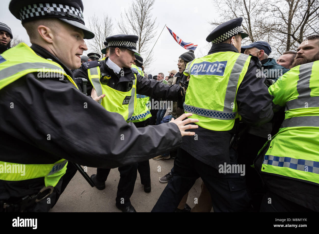 London, UK. 18th March, 2018. Hundreds gather at Speakers’ Corner, Hyde Park waiting to hear a speech written by Generation Identity’s Martin Sellner, delivered by former EDL leader Tommy Robinson. Credit: Guy Corbishley/Alamy Live News Stock Photo