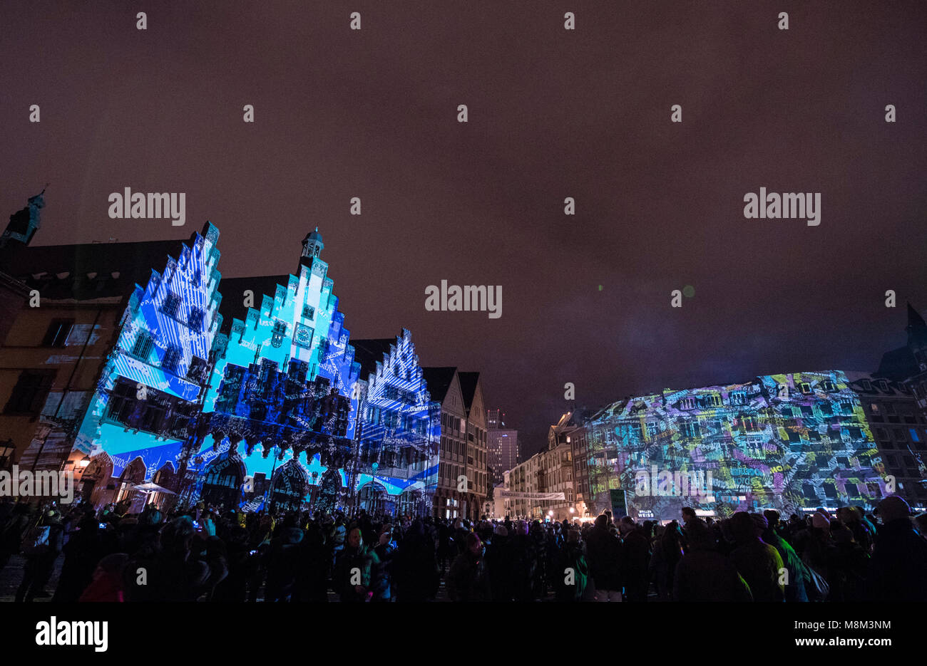 18 March 2018, Germany, Frankfurt am Main: Light installation "Frankfurt Fades" by artist Philipp Geist at the Roemer, as part of the "Luminale". The illuminations run until 23 March in Frankfurt and Offenbach. Photo: Boris Roessler/dpa Stock Photo