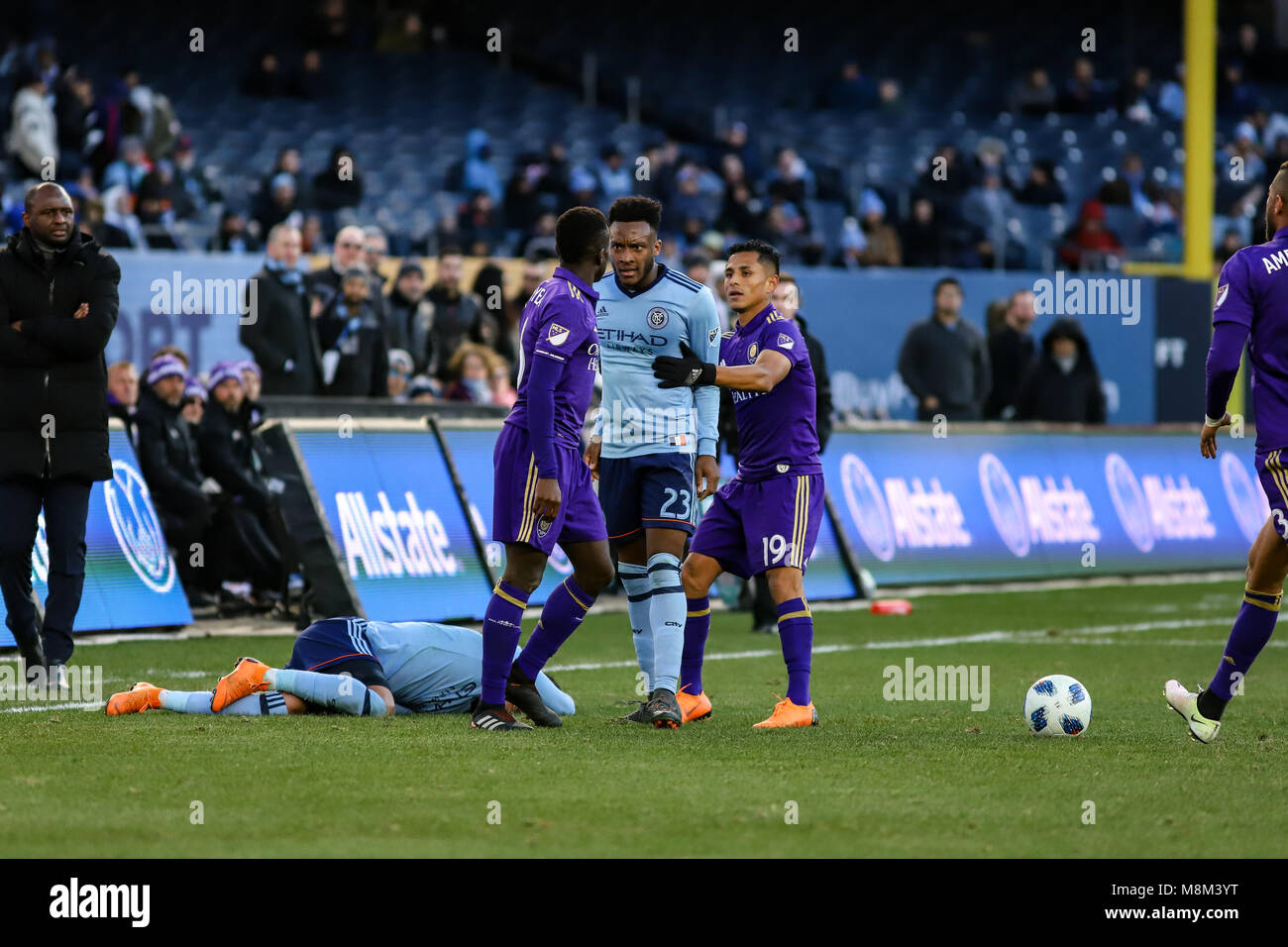 Bronx, NY USA - 17th March 2018 - Rodney Wallace (23) stares down Richie Laryea (6) after his strong tackle on Jesus Medina (19). Laryea picked up a yellow card for the foul. Stock Photo