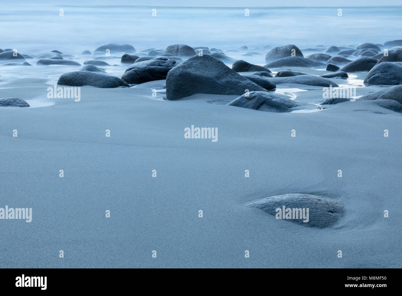 Big Stones at the Beach of Unstad, Lofoten, Norway Stock Photo