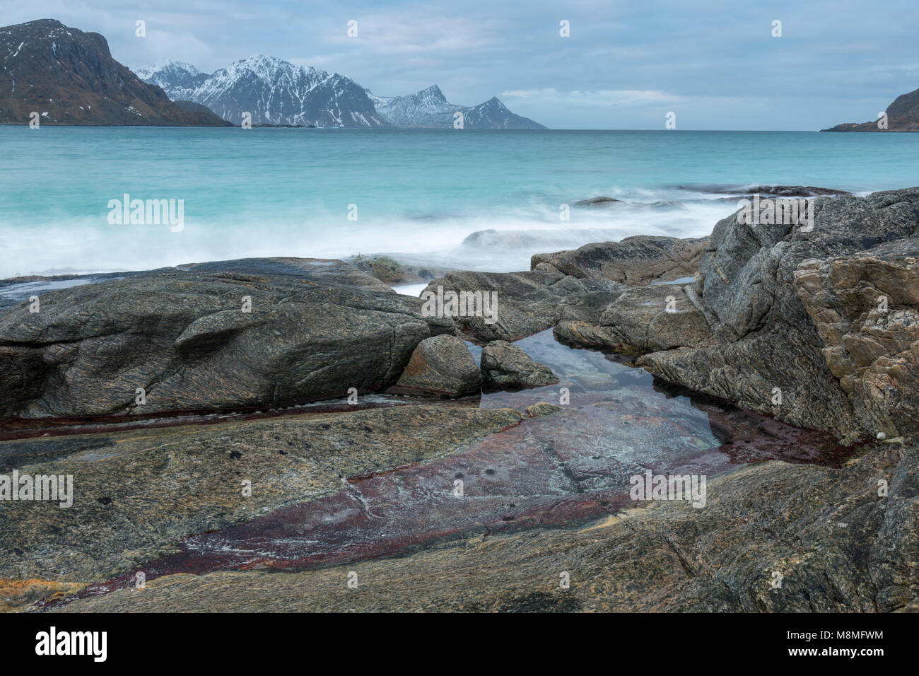 Little puddle at Haukland Beach, Lofoten, Norway Stock Photo