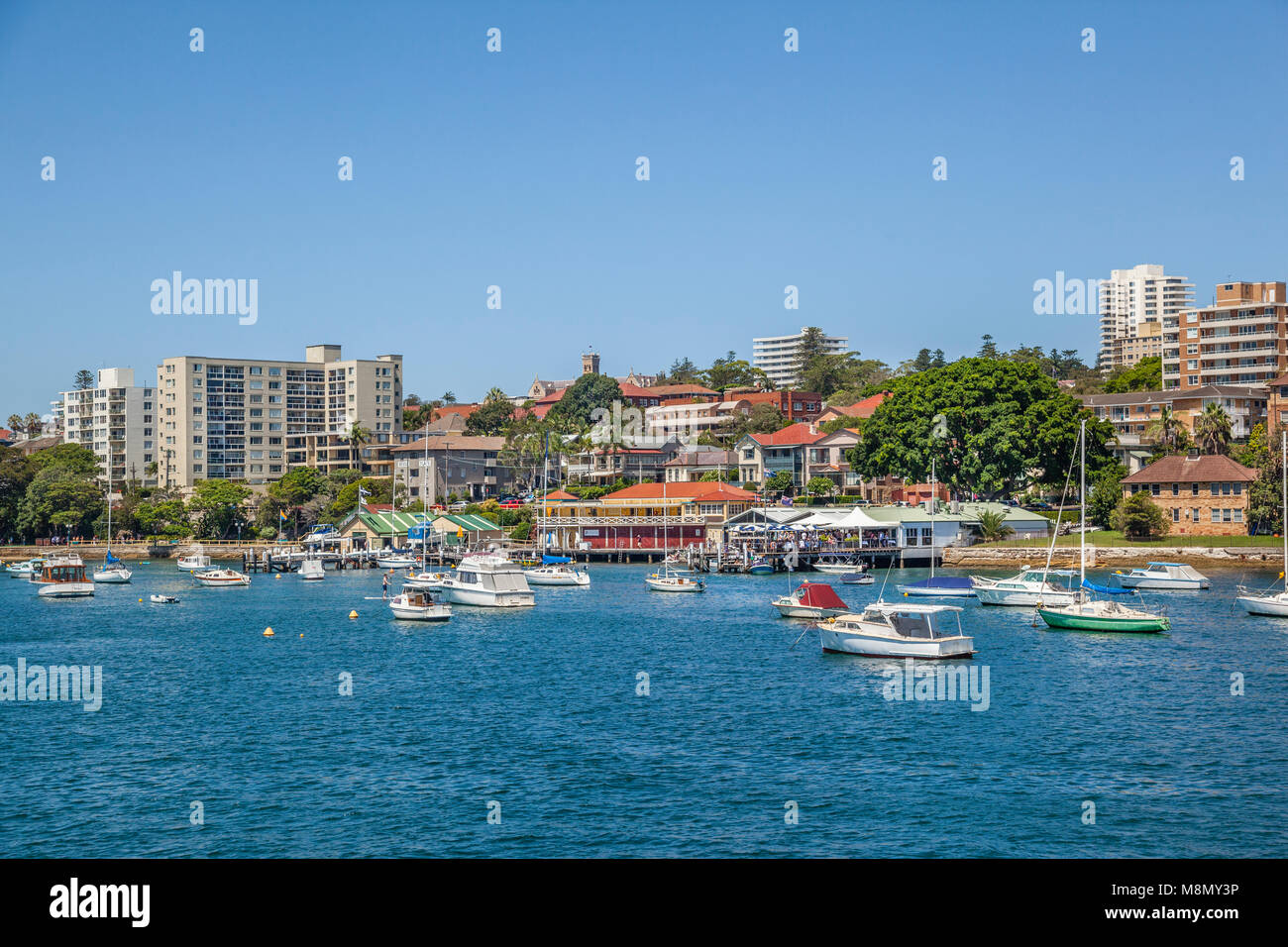 Australia, New South Wales, Sydney, Northern Beaches Region, view of Manly Cove with Esplande and Manly Yacht Club and Manly Sailing Club Stock Photo